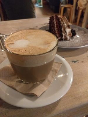 Coffee with oat milk and banana cake at Dempanadas in Valencia