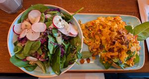 Bagel with tofu scramble and a gigantic side salad (with quinoa and lentils). at Beetnut in Zurich