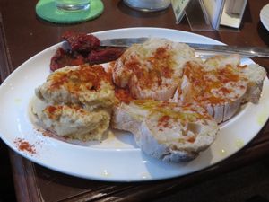 Hummus plate with dried tomatoes (vegan) at Katzencafe Miezhaus in Bielefeld