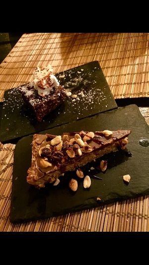 Chocolate brownie & snickers tart🥰 at Raizes in Quarteira
