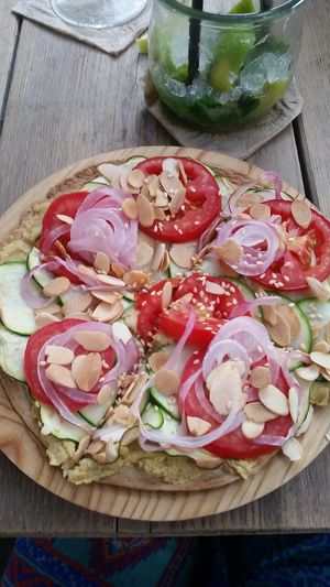Vegan hot flat bread with spiced hummus and veggies at Nude Cafe in Ibiza
