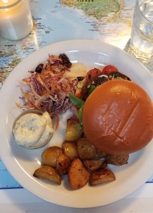 Impossible Burger, with Amazing Roasted Potatoes and Herb Aoili and a Ginger side salad at Atlas Bar in Copenhagen
