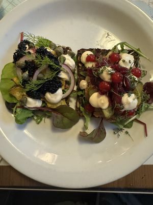 X-mas special smørresbrod “pickled herring” (left) and walnut pâté (right)   at Atlas Bar in Copenhagen