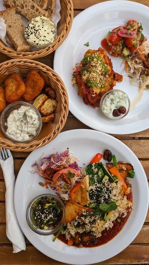 Vegan Tofu Manilla, Lasagna, Fish and Chips, Bread with Herb Butter at Atlas Bar in Copenhagen