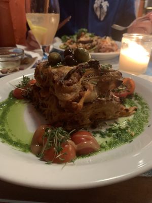 Lasagna and Tofu Manila in the back   at Atlas Bar in Copenhagen