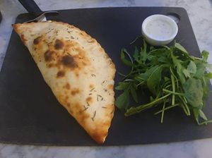 (Calazone) Orto: Char-grilled courgettes, spinach, tomato, garlic, roasted peppers and some serious chilli. Served with salad and house dressing. #Veganuary at Pizza Express - Trafford Centre in Manchester