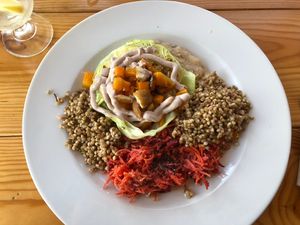 Buckwheat with braised cabbage, squash and bean purée   at Gaia Loja Restaurante in Rogil
