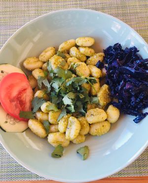 Gnocchi with pesto and Salad  at Gaia Loja Restaurante in Rogil
