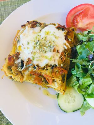 Veggies lasagne with mozzarella cheese  at Gaia Loja Restaurante in Rogil