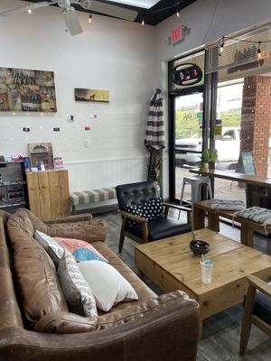 Seating area inside cafe  at Antoinette's Cafe in Buford
