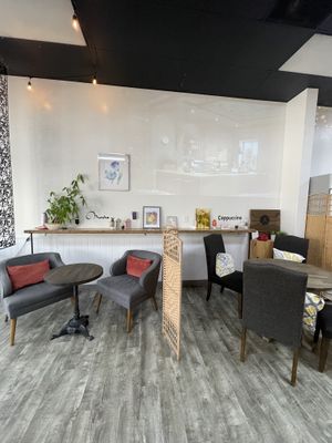 Seating area inside cafe  at Antoinette's Cafe in Buford