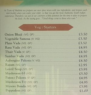 Menu on the outside of the building at Cafe Malabar in Norwich