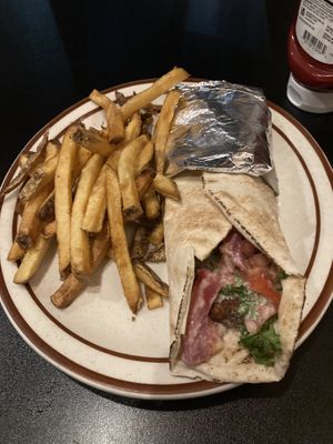 Delicious falafel wrap with fries!   at Cedars Lebanese Restaurant in Roanoke