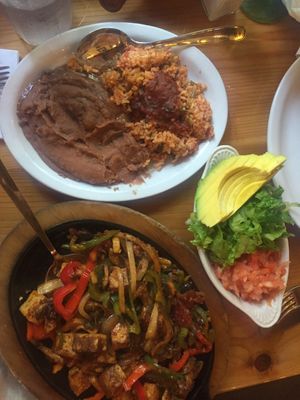 Tofu fajitas with refried beans, lettuce, avocado, tomato at Polli's in Makawao