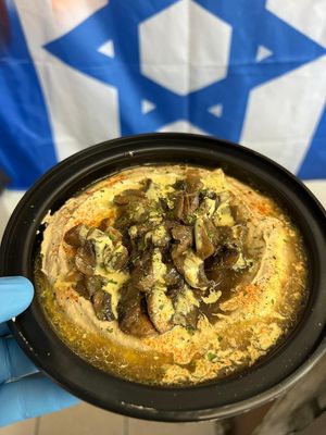 Hummus with Mushrooms. Comes with 3 mini pita breads. at FalafaLafa in Brooklyn