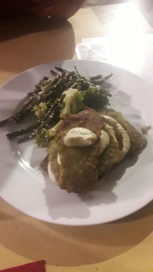 Pea-Tempeh and celeriac cream millefeuille with green beans and broccoli at Soul Kitchen in Genoa