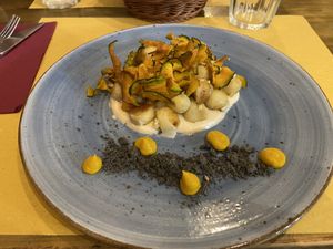 Gnocchi di patate e grano saraceno,salsa alla nocciola, zucca croccante e terra di nocciole  at Soul Kitchen in Genoa