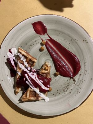 Potato waffle with beetroot purée, crispy chickpeas, and a vegan cream sauce  at Soul Kitchen in Genoa