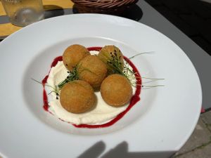 Bean balls with cream cheese, raspberry and chive sprouts - very tasty! at Soul Kitchen in Genoa