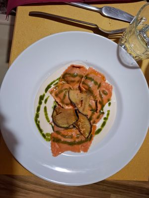 Ravioli al pomodoro ripieni di melanzane, fonduta di provolone, olio al basilico at Soul Kitchen in Genoa