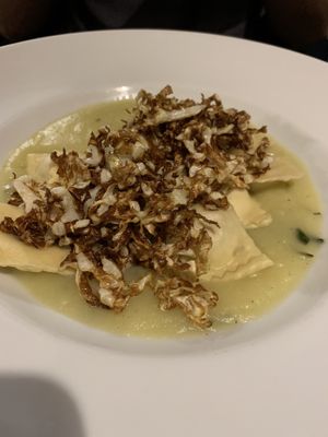 Ravioli with fried onions on top at Soul Kitchen in Genoa