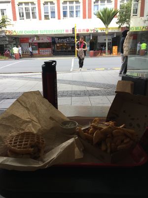 Chicken and waffles sandwich at Lord of the Fries - St Kevins Arcade in Auckland