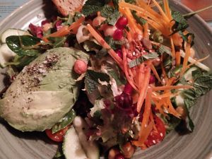 Delicious vegan salad with lovely bread at was wir wirklich LIEBEN in Hamburg