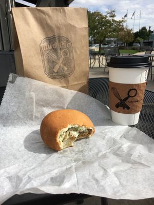 Pumpkin spice latte and Green onion & ";sausage"; Kolche at Mud Pie Vegan Bakery and Coffee in Mission