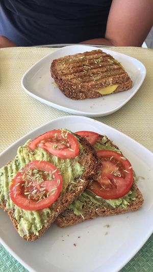 Avocado toast and vegan cheese toast at Armazem Integral in Portimao
