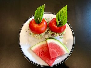 Organic heirloom tomatoes and fresh mouthwatering melon at Farm Fresh Cafe in Brunswick