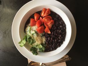 Kale Grits with Black Beans and Smoked Tomatoes at Farm Fresh Cafe in Brunswick