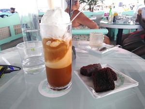 Vegan ice coffe with coconut ice cream (the cake on the right is not vegan) at Akation Pastry Boutique in Naxos