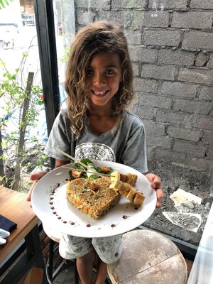 cash eatiing nasi goreng at Vinny's Warung in Canggu