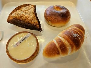 Sea salt croissant, strawberry bagel, apple and caramel pie, and lemon tart at Yiihotang 一禾堂 - Songshan District in Taipei