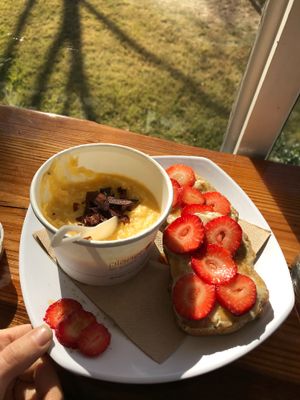 Vegan cheesy grits & strawberry vegan cream cheese on gluten free toast  at Well Fed Louisiana in Shreveport