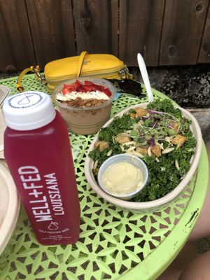 Cacao smoothie bowl, kale Caesar salad, rose water  at Well Fed Louisiana in Shreveport