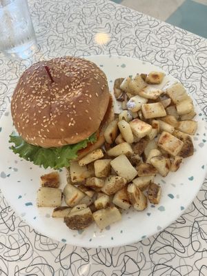 Nashville hot chicken with home fries  at Spiral Diner & Bakery in Denton