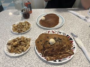 Closest is blueberry pancakes… other was the normal pancakes  at Spiral Diner & Bakery in Denton