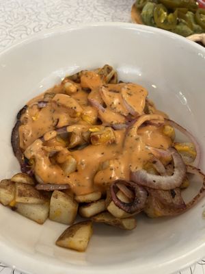 Loaded potatoes (on appetizer)  at Spiral Diner & Bakery in Denton