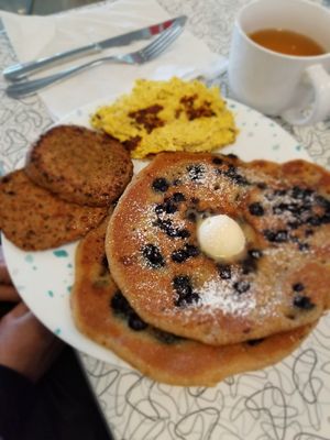 Blueberry pancakes, sausages, and tofu scramble. at Spiral Diner & Bakery in Denton