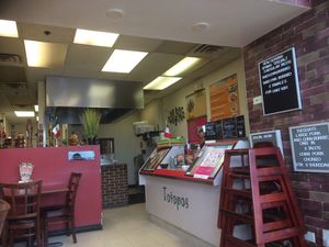 Inside mostly take-out 3 tables to sit at Totopos Mexican Restaurant in Naperville