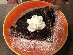 Sweet dessert crepe with vegan whipped cream at La Crêperie des Alpes in Aix-les-bains