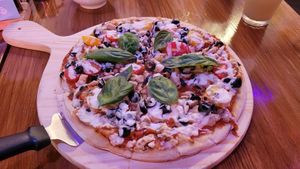 Capresse Pizza at Huacamole Vegan Food in San Pedro