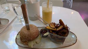Chik'N sandwich with sweet potato fries and Tropical drink at Huacamole Vegan Food in San Pedro