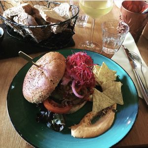 Burger with hummus and sprouts   at Mr. & Mrs. Watson in Amsterdam