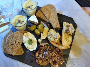Starter for 2 persons with eggsalad, cheeze, eggplant waffles and aioli and soup. at Mr. & Mrs. Watson in Amsterdam