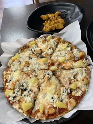 Vegan satay skewers and Hawaiian pizza  at Veggie Hut in Birmingham