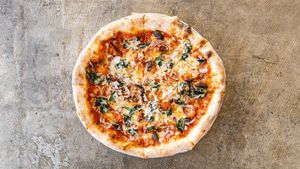 Vegan Toscana - sun dried tomatoes, red onion, vegan feta, spinach, garlic, vegan mozzarella, olives  at Small Print Pizza Bar in Windsor