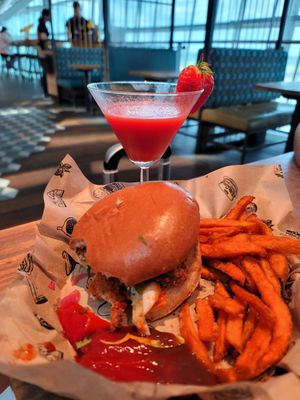 Vegan chicken burger with sweet potato fries and strawberry basil daiquiri at LHR - Giraffe - T5 in West London