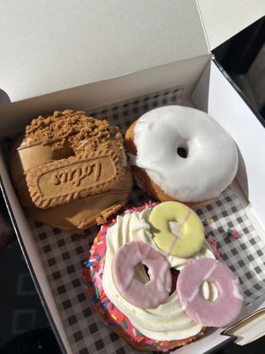 Three vegan doughnuts (Biscoff, vanilla glazed, and party sprinkle)  at Doughnotts in Nottingham